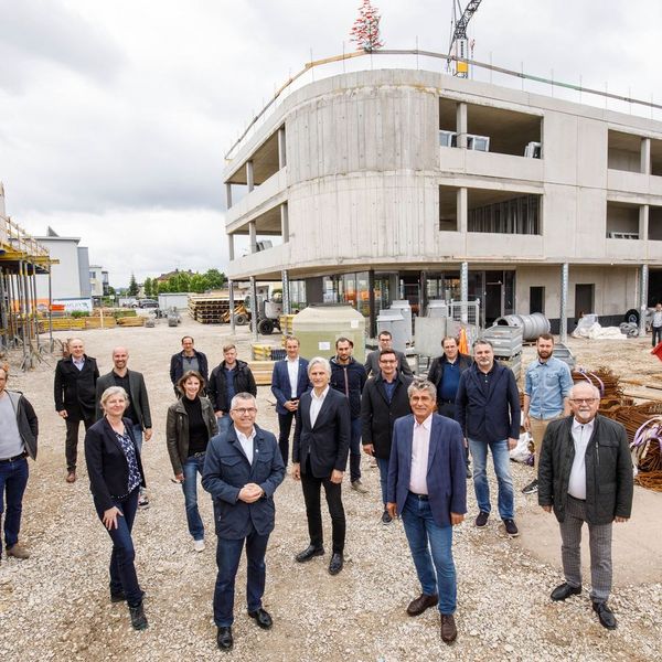 topping_out_ceremony_at_weidfeld_dionysius_neighborhood_center_weidfeld_construction_progress